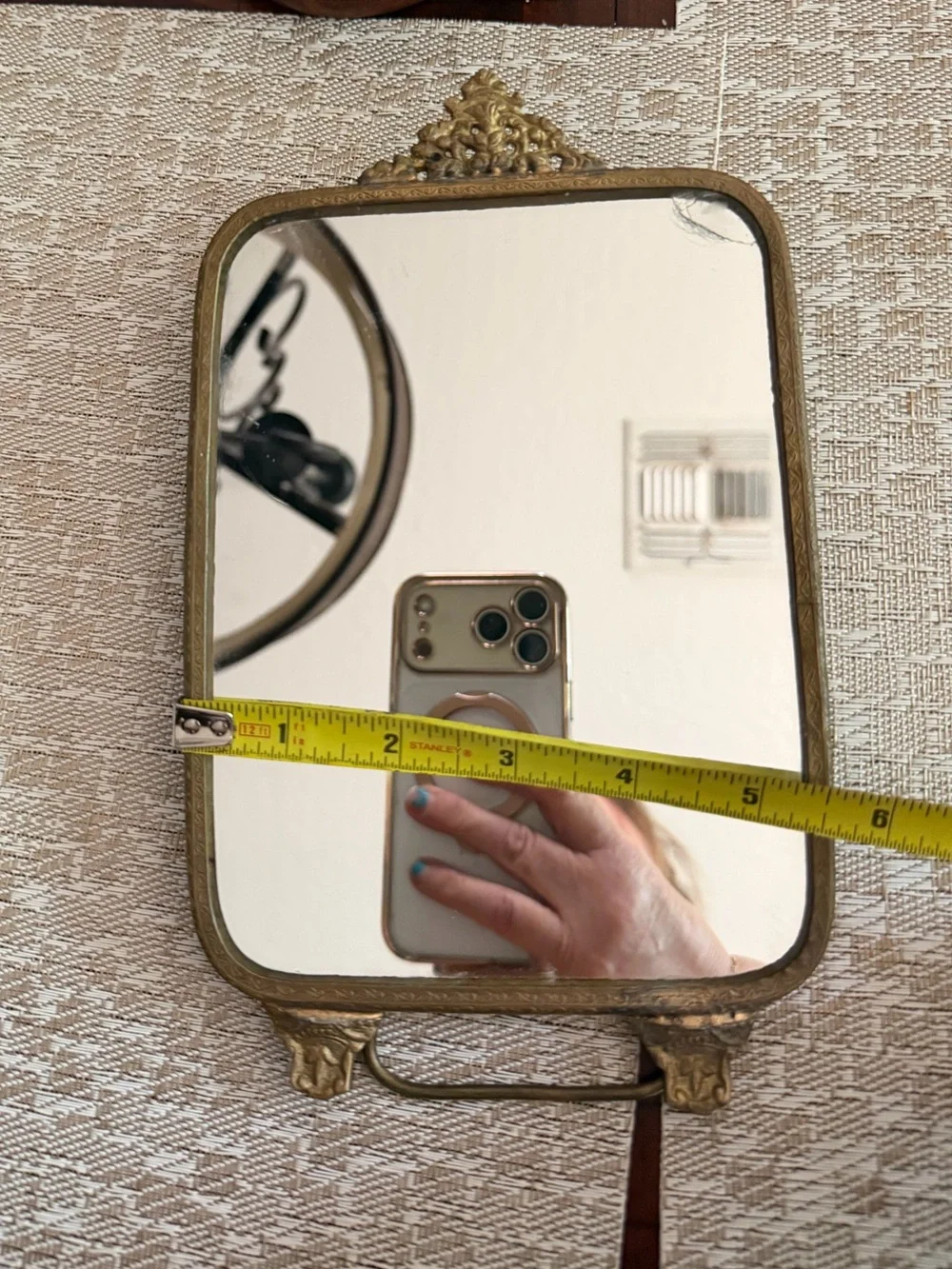 Vintage brass mirror on stand